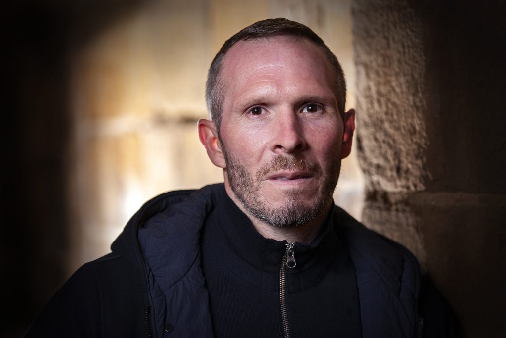 Michael Appleton, Manager of Lincoln City F.C. photographed by the city’s cathedral.