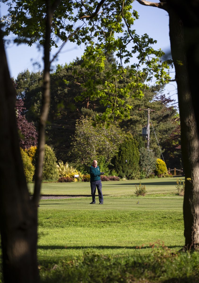 The very first golfers to play at Market Rasen Golf Club in Lincolnshire after lockdown restrictions were relaxed for the sport. Keith Borst plays the third hole.